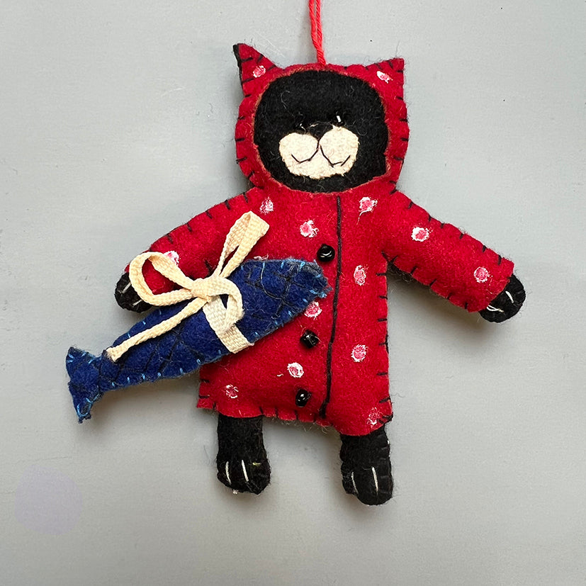 Felt cat with a fish decoration