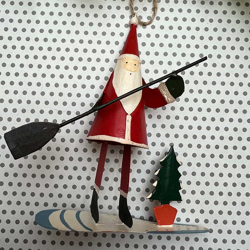 Santa on a paddle board