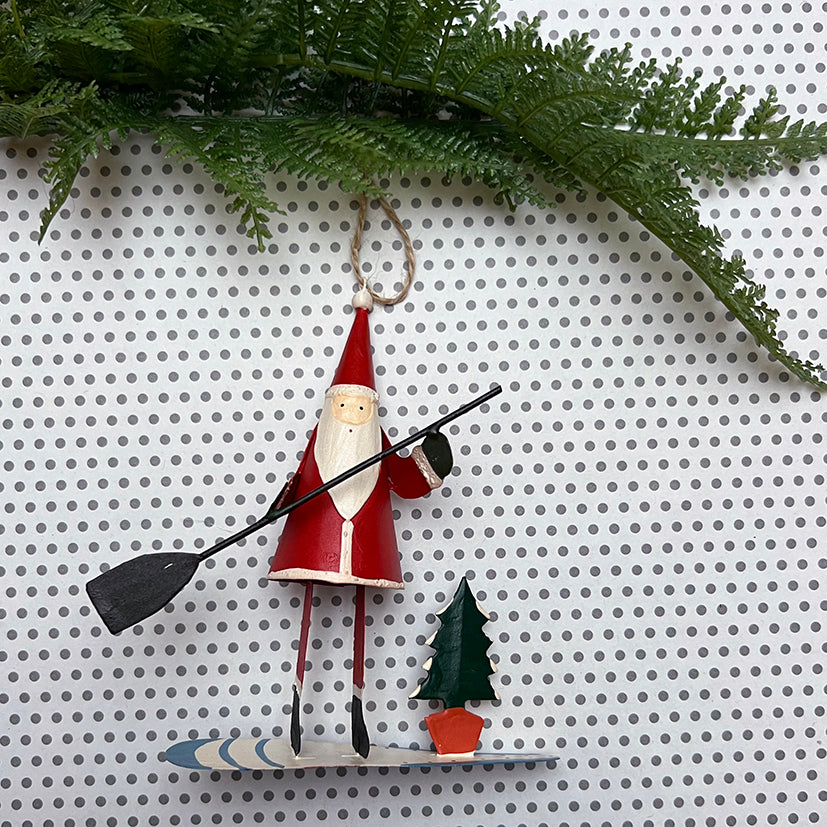 Santa on a paddle board