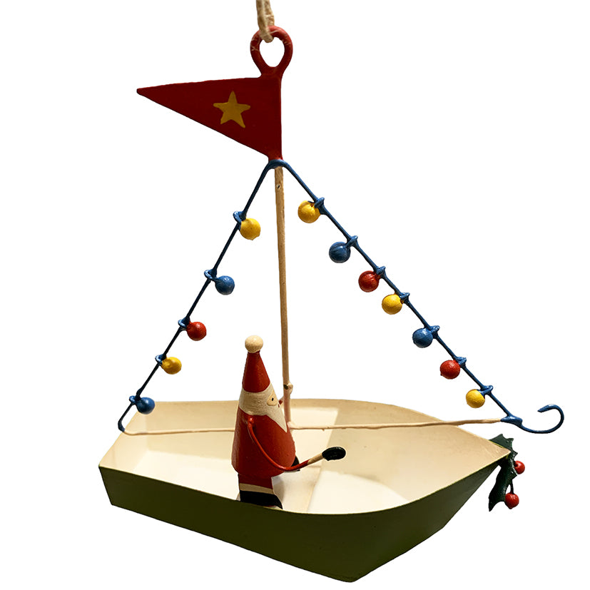 Santa in a boat with fairy lights