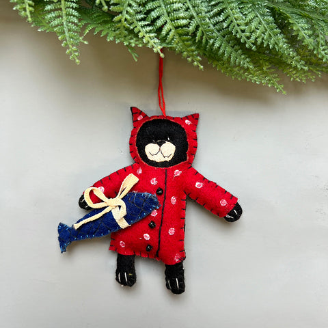 Felt cat with a fish decoration
