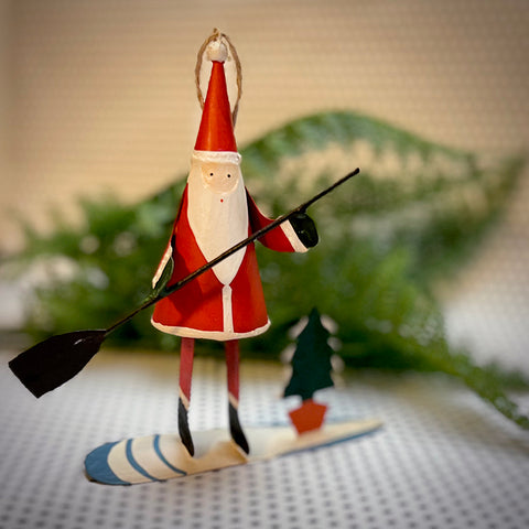 Santa on a paddle board