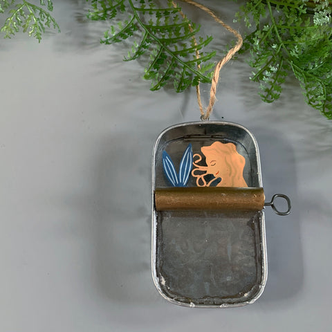 mermaid in a tin