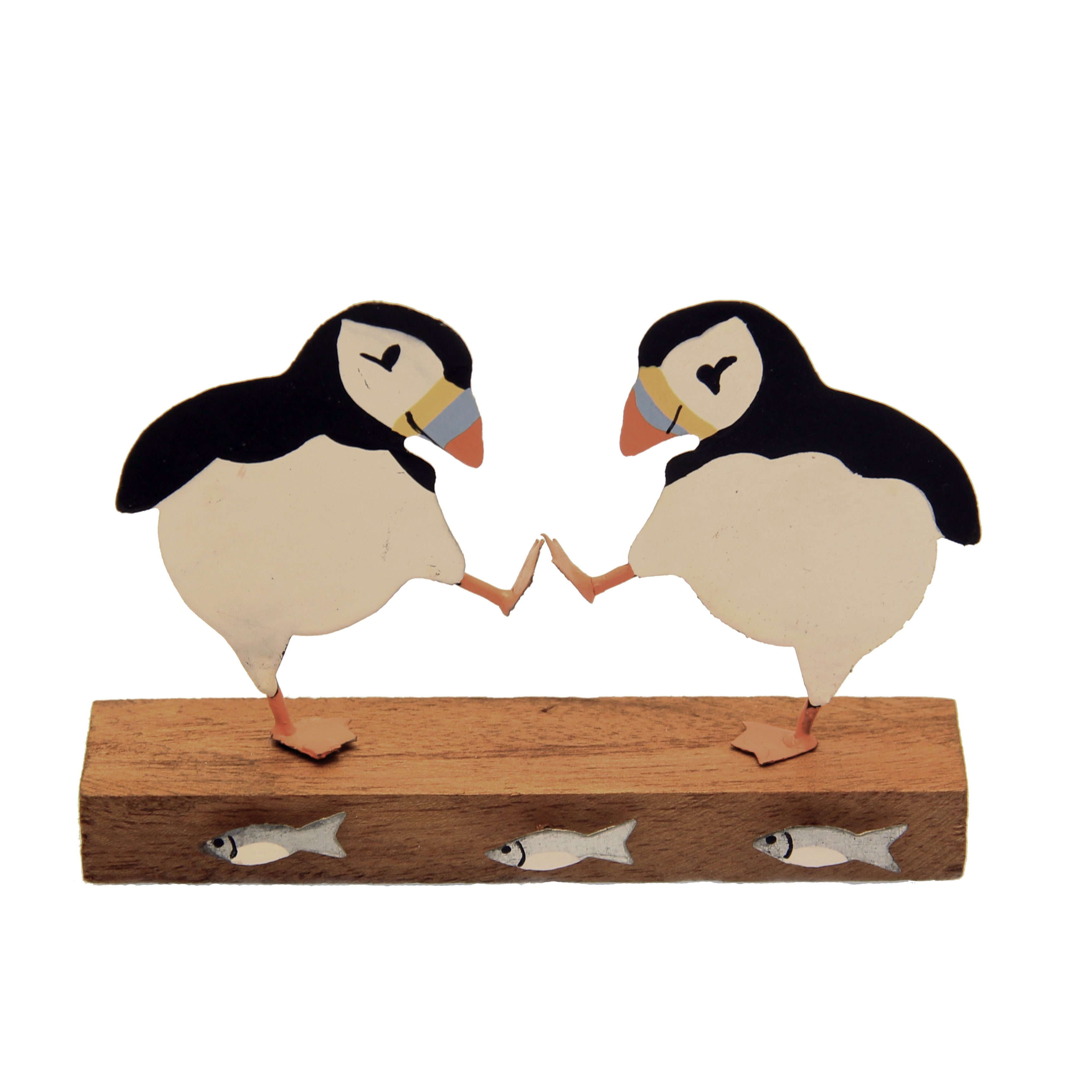 Two puffins on wood